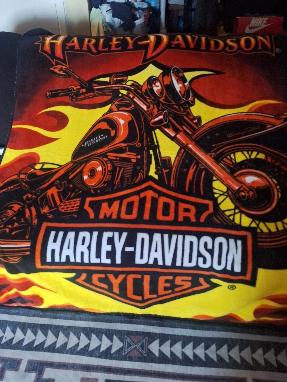 Harley Davidson Blanket in black and orange is a cozy and stylish addition.